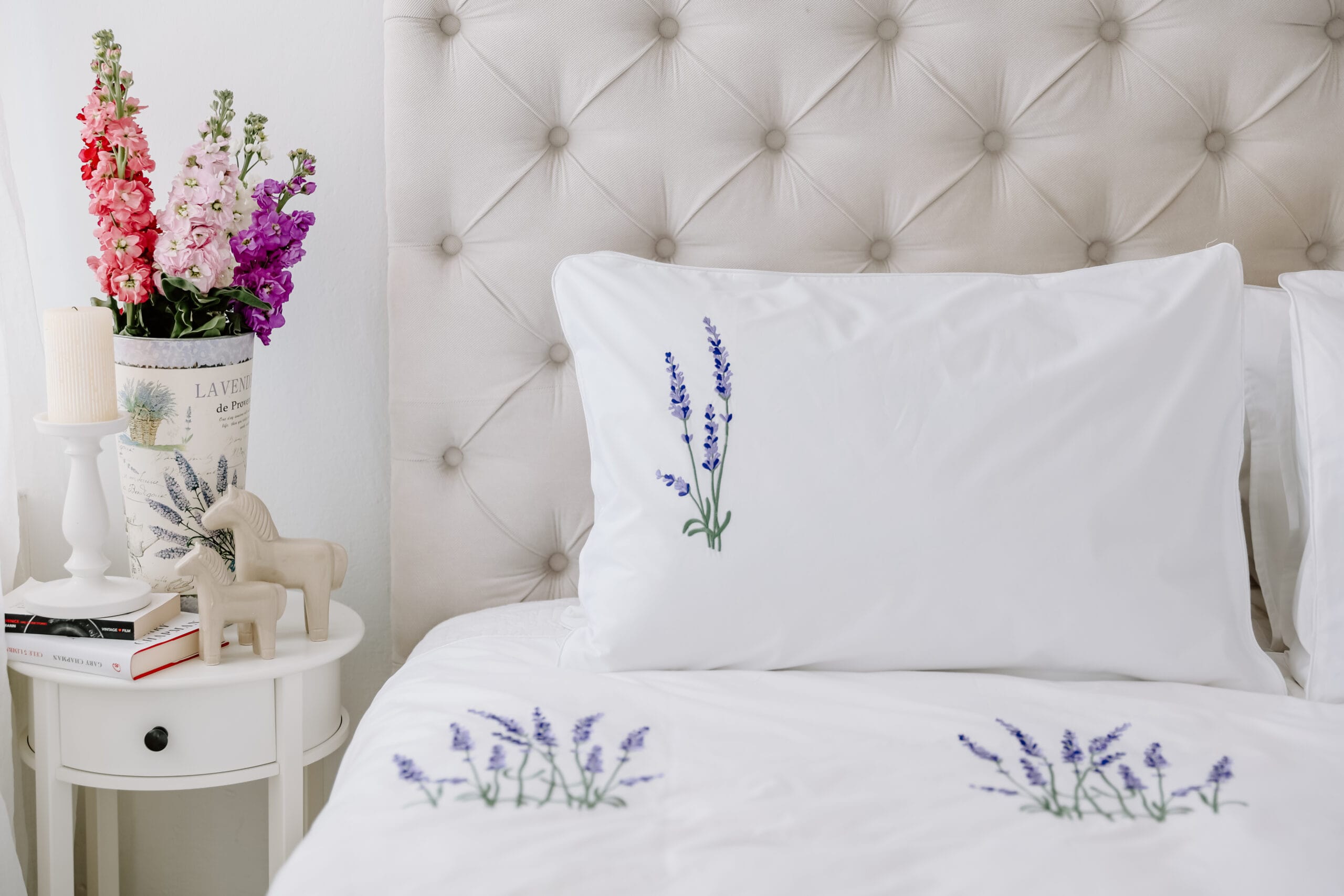 white premium cotton bedsheets with embroided flower design